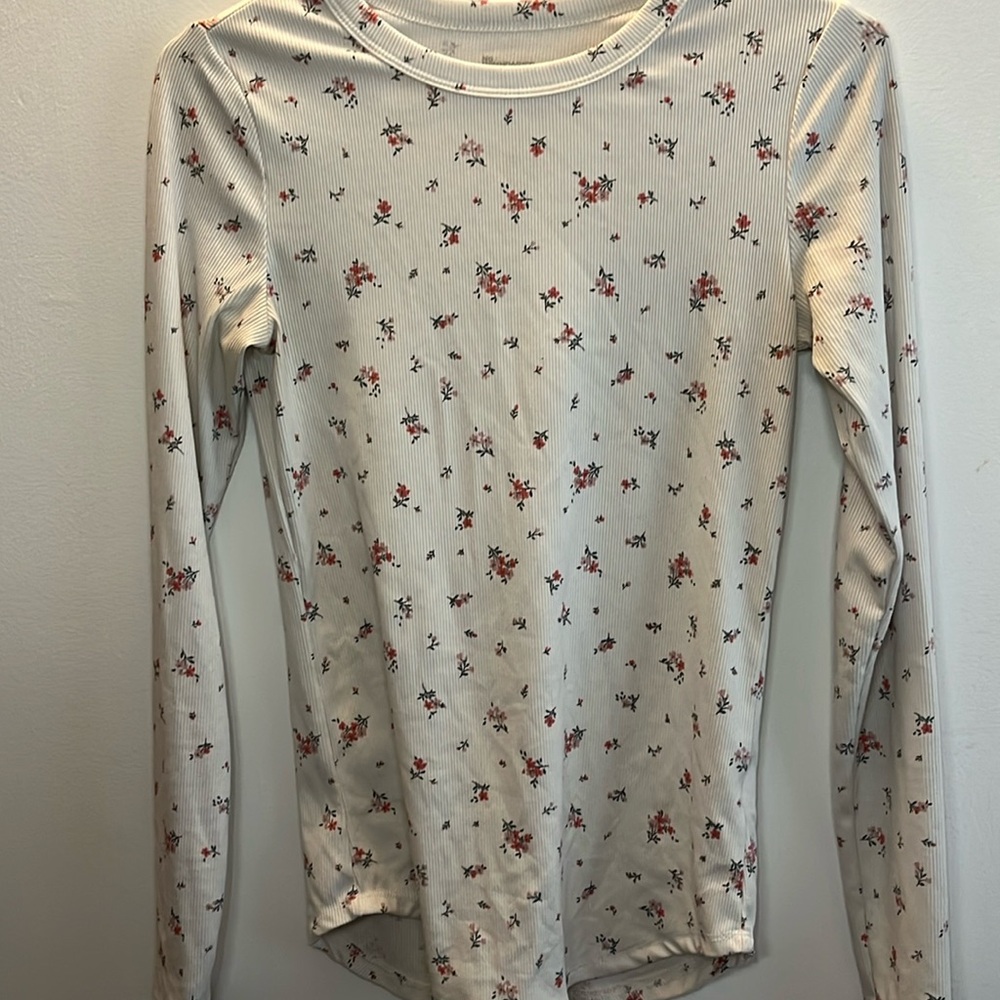 Ripped tight floral long sleeve.